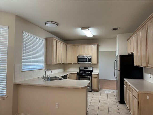 Foto del edificio - 414 Darkwoods Dr
