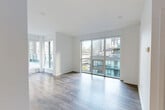 This contemporary condominium, located at 961 Bay St in the heart of Toronto, offers a sleek and efficient living space spanning 680 square feet. The unit boasts two bedrooms and two bathrooms, making it ideal for urban professionals or small families. The primary bedroom, measuring 100 square feet, provides a comfortable retreat within the home.

The interior is characterized by its modern design, featuring an open-concept layout that maximizes the use of space. Floor-to-ceiling windows flood the rooms with natural light and offer panoramic views of the surrounding cityscape. The living areas are adorned with stylish laminate flooring, creating a seamless flow throughout the space.

Both bathrooms are thoughtfully designed with neutral tones, featuring modern fixtures and tiled surfaces. The kitchen, while not visible in the images, likely continues the contemporary aesthetic of the rest of the unit.

A standout feature of this property is the spacious balcony, which provides an extension of the living space and offers breathtaking views of Toronto's iconic skyline. The balcony is perfect for outdoor relaxation or entertaining guests while enjoying the urban atmosphere.

The building itself is part of a modern high-rise complex, surrounded by other residential towers and commercial structures, emphasizing its prime downtown location. Residents can enjoy the convenience of city living with easy access to amenities, transportation, and Toronto's vibrant urban culture.