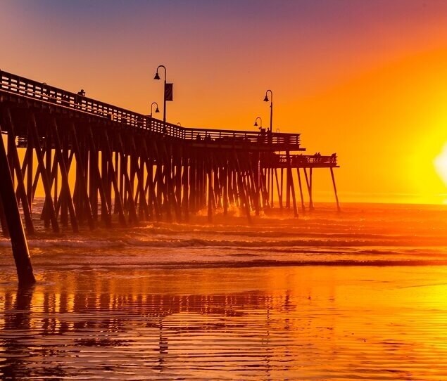 Sun setting over the Pismo Beach pier