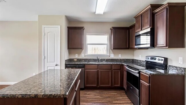 Foto del edificio - 6907 Musclewood Rd