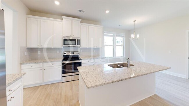 Building Photo - 3720 Grand Prix Dr NE