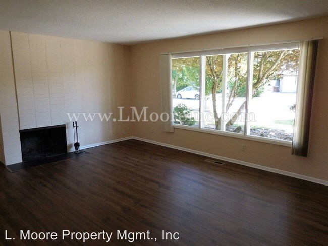 Building Photo - 6895 SW Rollingwood Dr
