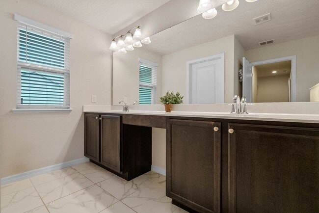 Building Photo - Water Front Home- 4 Large Bedrooms-3 baths Gated Community Call Sheila Campbell 407-687-7900