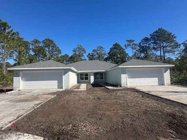 Building Photo - Brand new construction Charming 4BR 2BA in...