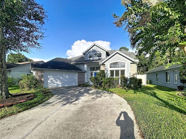 Photo - "Spacious 4-Bedroom Oasis with 3 Full Baths in Tampa - 2,698 Sq Ft of Comfort at 9122 Rockrose Dr!" House