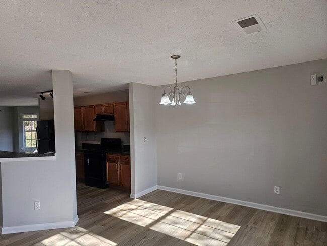 Building Photo - Move In special! 1/2 off the first Months rent!! 2 Bedrooms, 2.5 Baths Townhouse located in a Qui...