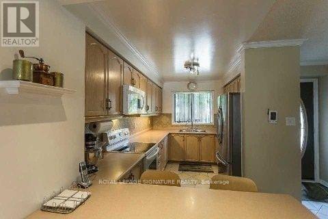 Photo du bâtiment - 5865 Dalebrook Crescent