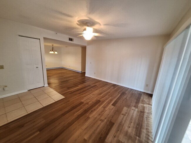 Entry. living room and dining room - 10141 Maddox Ln