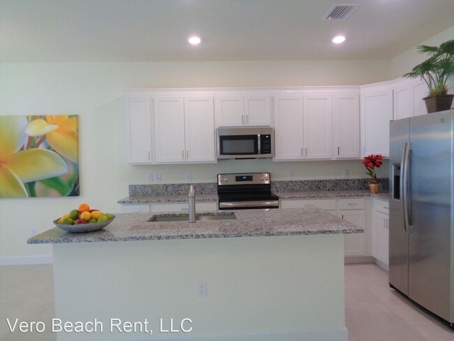Building Photo - 3 br, 2.5 bath House - 10004 W. Villa Cir