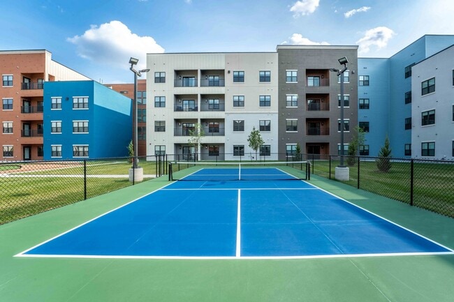 Elevate your lifestyle at Union Mill with our state-of-the-art tennis courts, perfect for both casual players and serious athletes. Embrace an active community and stylish living. Schedule your tour today to see it all in person! - Union Mill