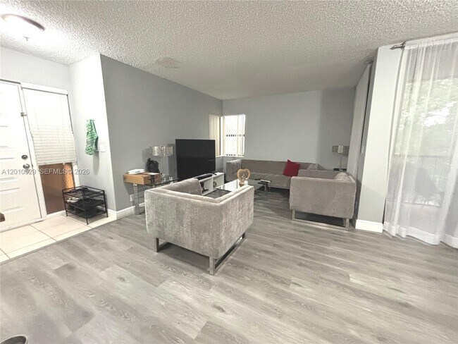Foto del edificio - 3859 Coral Tree Cir