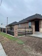 Front View - 521 W Van Week St