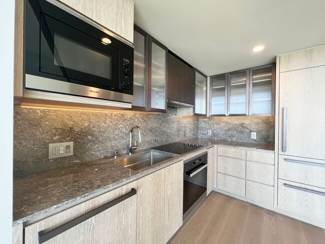 Building Photo - Live Lavishly at Ko'ula in Ward Village - ...