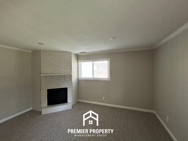 Photo - Charming 3BR Southaven Home | Brick Fireplace, 2-Car Garage & Fenced Yard