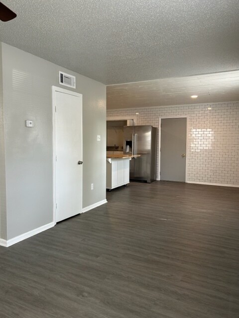 Living Room/Dining View - 713 Heavens Dr