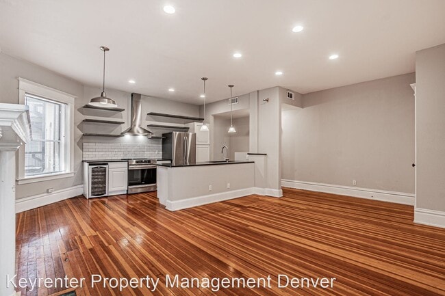Building Photo - 2 br, 1 bath House - 1210 E Colfax  Unit 304