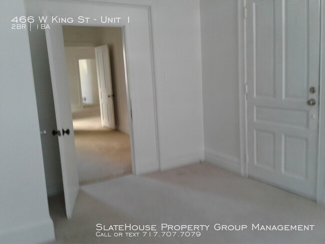 Building Photo - First floor two bedroom with yard!