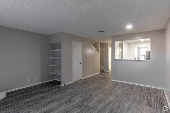 2 habitaciones, 2,5 baños - 1094 pies cuadrados - Sala de estar - Hemingway House Apartments