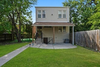 Building Photo - 6540 S Vernon Ave