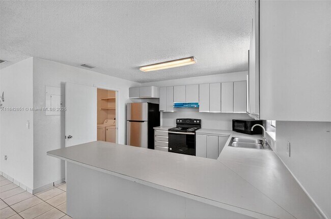 Building Photo - 4782 NW Flagler Terrace