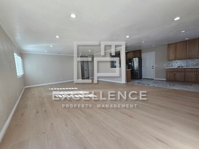 Building Photo - Newly Remodeled Home - Kitchen, fixtures, paint, everything new! Spacious yard and pets negotiable!