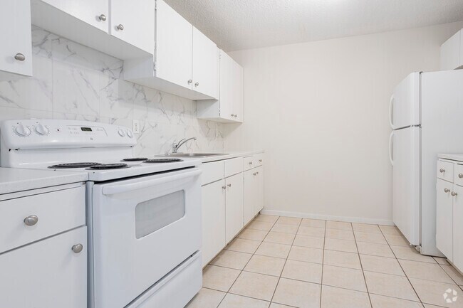 2 chambres, 1 salle de bain - 700 pi2 - Glenbow Manor