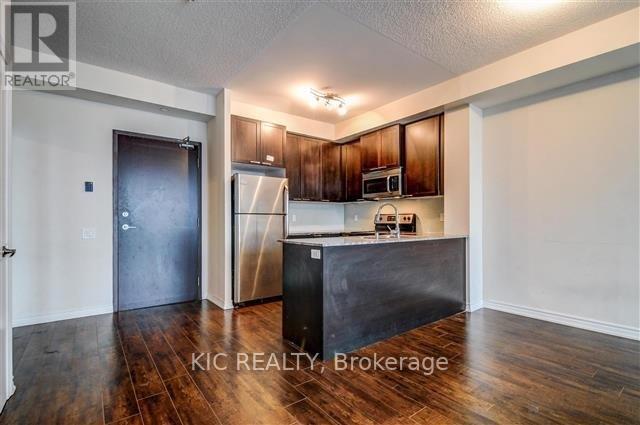 Photo du bâtiment - 1328 Birchmount Rd