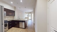 Step into a world of possibility in this exquisite apartment at Los Alisos At Mission Viejo. As you enter, you're greeted by an abundance of natural light streaming through large windows, illuminating the rich, warm tones of the hardwood floors. The open-concept living area beckons you to imagine cozy evenings or vibrant gatherings with friends.

The heart of this home is the chef-inspired kitchen, boasting sleek stainless steel appliances, elegant dark wood cabinetry, and a show-stopping granite countertop that doubles as a convenient breakfast bar. Modern pendant lighting adds a touch of sophistication, creating the perfect ambiance for culinary adventures.

The spacious bedroom is a serene retreat, featuring plush carpeting and ample closet space for all your storage needs. Large windows flood the room with sunlight, creating a bright and airy atmosphere that's perfect for rest and relaxation.

Indulge in luxury in the well-appointed bathroom, complete with a stylish vanity, gleaming granite countertop, and a combination shower and bathtub. The convenient in-unit laundry ensures that modern convenience is always at your fingertips.

This thoughtfully designed apartment isn't just a place to live – it's a canvas for your dreams and aspirations. Whether you're a young professional seeking a stylish home base or looking to downsize without compromising on quality, this property offers the perfect blend of comfort, style, and location. Experience the best of Mission Viejo living – your new lifestyle awaits!
