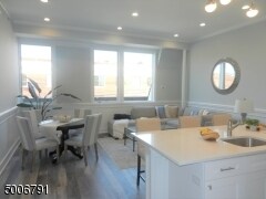 Staged View:This Private Unit Features An Open Floor Plan w/High Ceilings & Wood Flooring Throughout - 346-3 Millburn Ave
