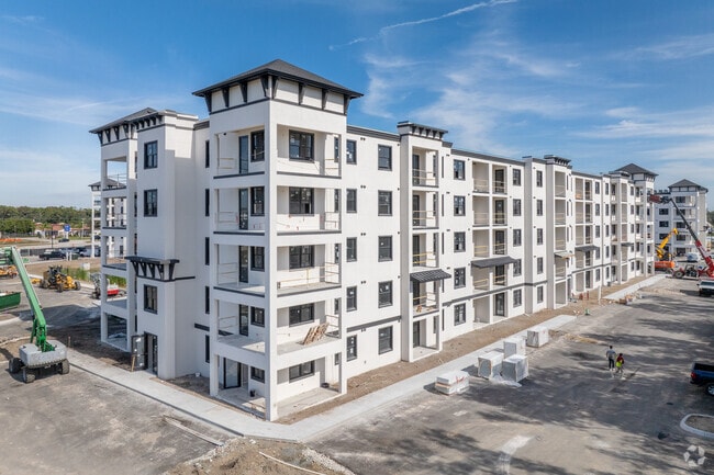 Building Photo - Evergreen Pine Island