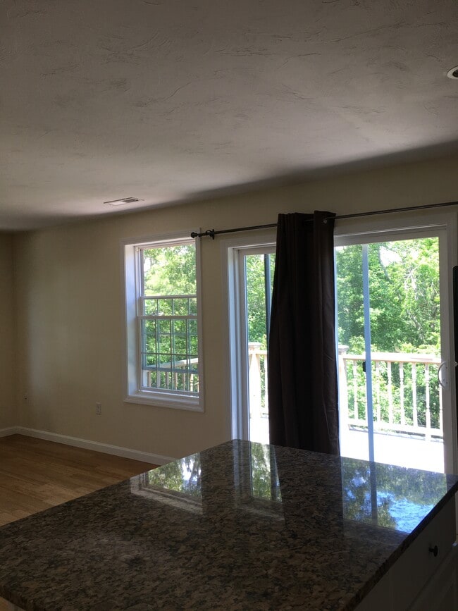 Slider to deck, off Living area and kitchen - 12 Cranberry Rd