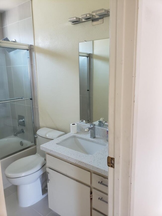 bathroom with tub - 4667 E Mountain View Dr