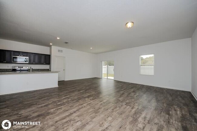 Building Photo - 104 HIDDEN LAKE LOOP, Haines City, FL 33844