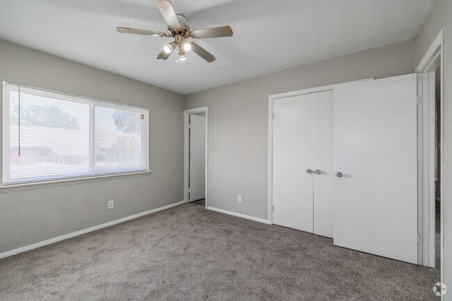 3BR, 2BA - 1,040SF - Primary Bedroom - West Scenic Apartments