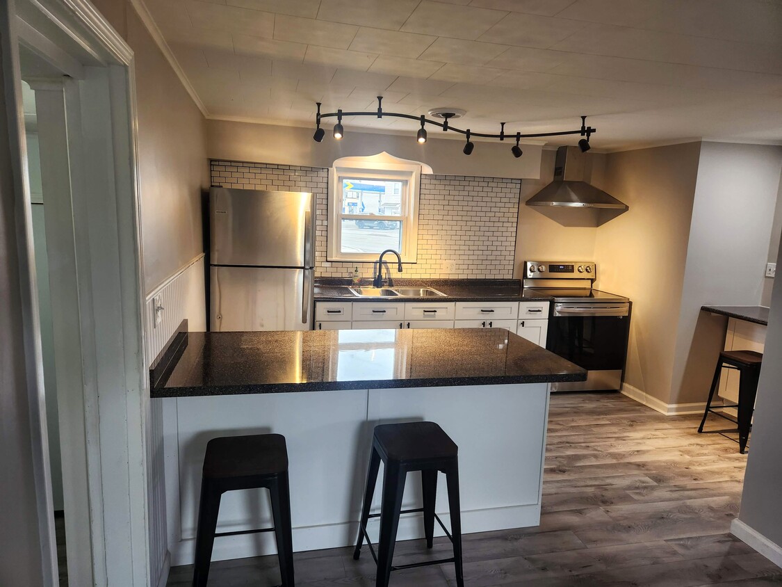 Kitchen with Island - 4620 Military Rd