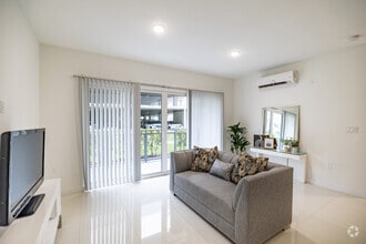 2BR, 2BA - 1,176SF - Model D - Living Room - Modern Towers Apartments