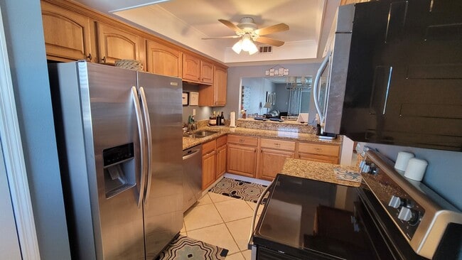 Building Photo - Fully Furnished Condo in the heart of Coco...