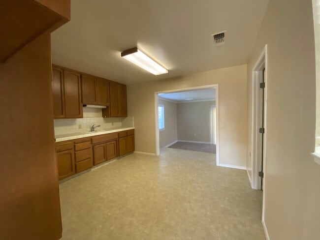 Building Photo - Action Properties RES Inc offering- Central Roseville - 2 Bed, 1 Bath - Separate Living and Famil...