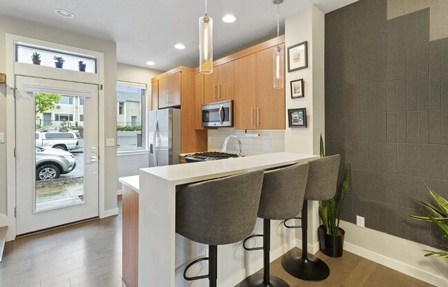 Building Photo - Dual Masters! Stunning Modern End-Unit Townhome in Buckman Bright, Airy & Designed for Comfort