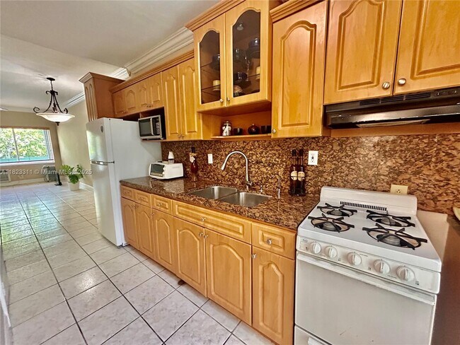 Building Photo - 6490 Collins Ave