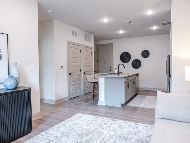 The Palafox: 1BR, 1BA- Living Room - The Flats at Ransley