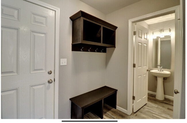 Door to garage and 1/2 Bath - 3338 6th Way E