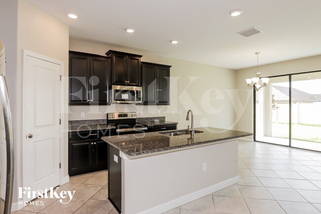 Foto del edificio - 9821 Ivory Dr