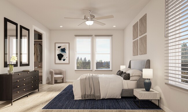 Enjoy spacious bedrooms with ample natural light and closet space. - Amavi Kissimmee