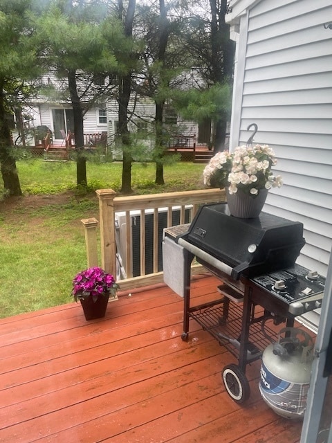 Back deck, located off the kitchen through sliding doors. - 48 Garfield St