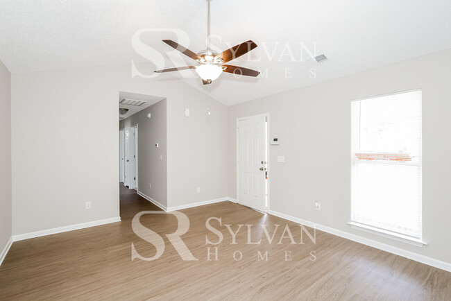 Building Photo - Welcome to this charming abode.