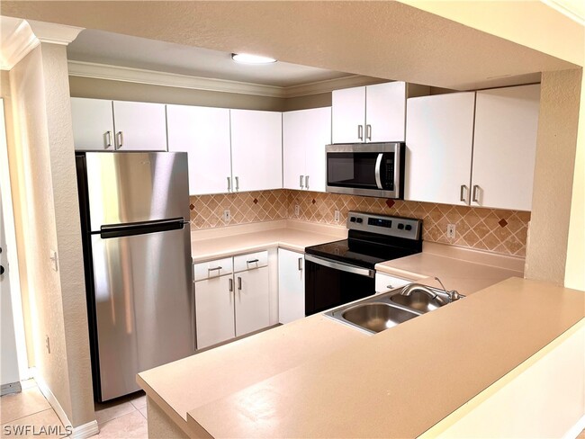 Building Photo - 8234 Key Royal Cir