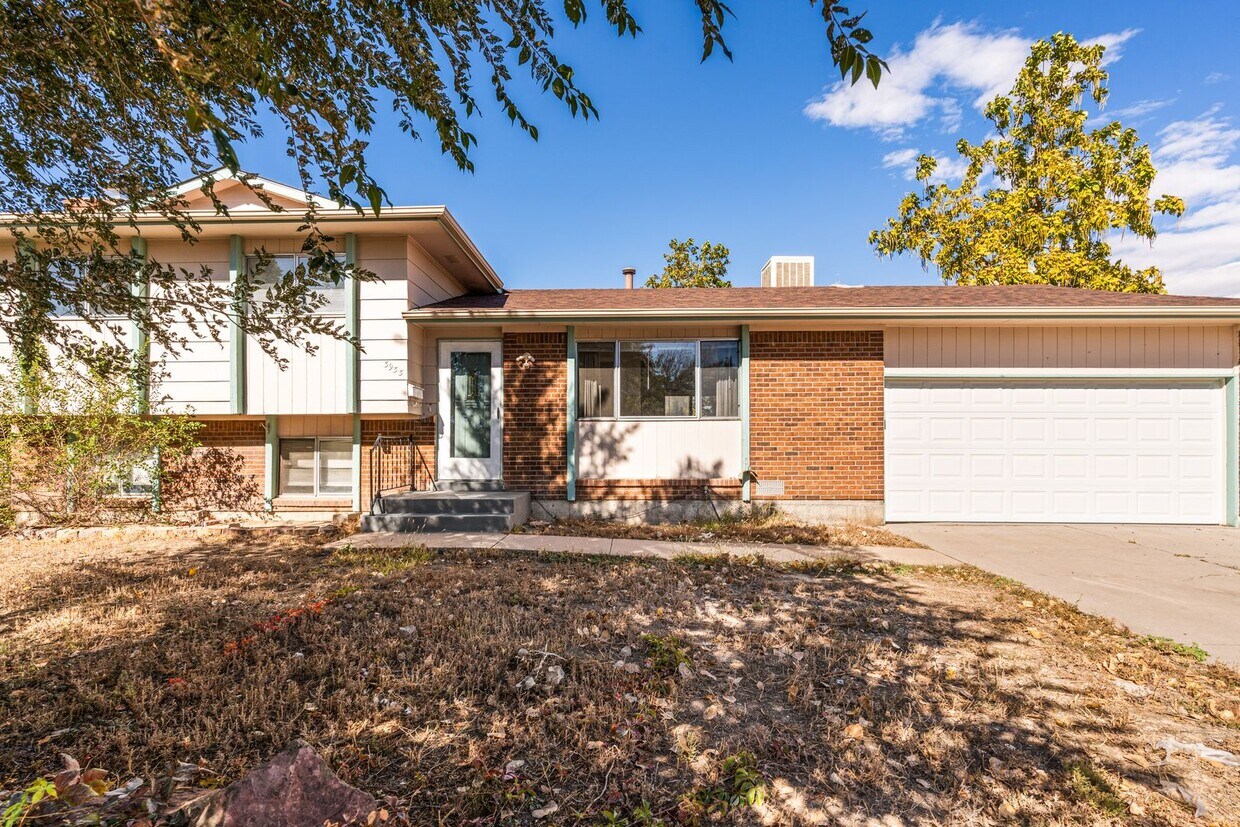 Primary Photo - Tri-level Home with Spacious Backyard near...
