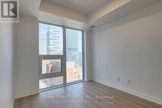 Building Photo - 100 Queen St E