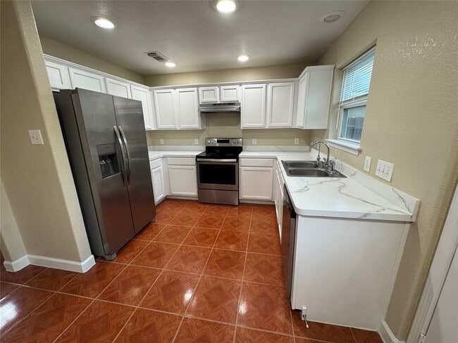 Foto del edificio - 13303 Ridgewood Knoll Ln